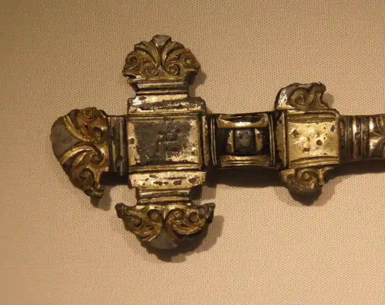 Metal cross, swastika in the center